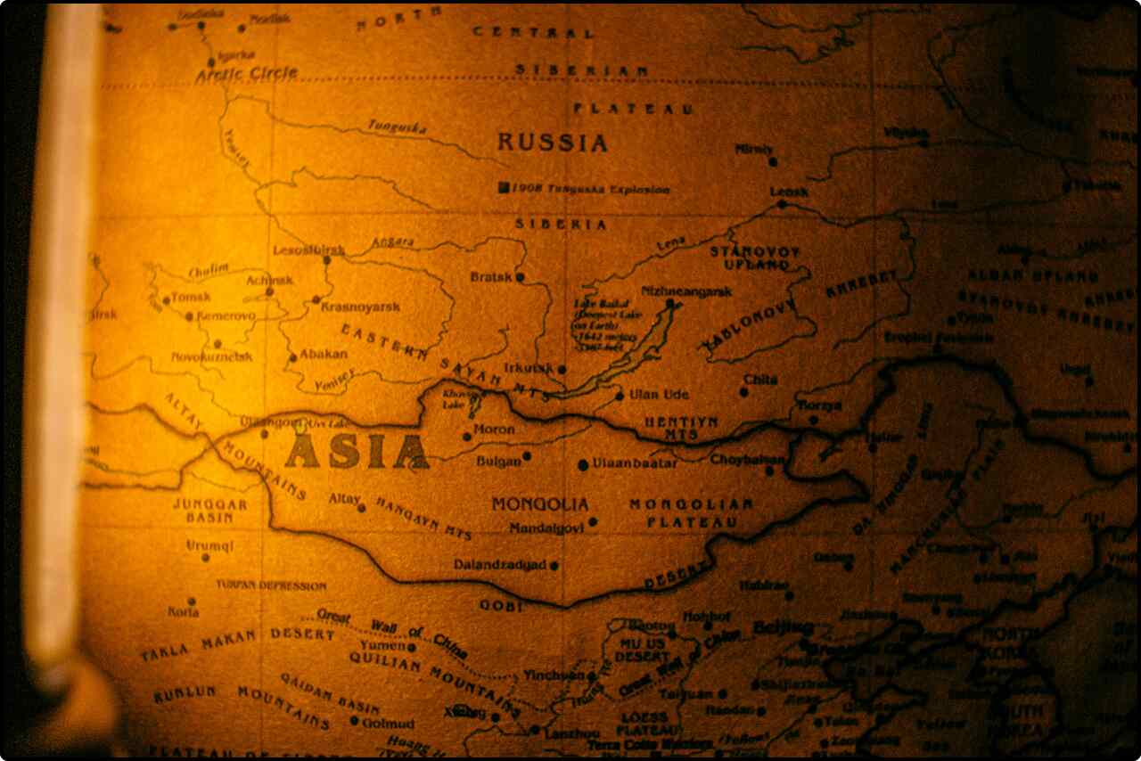 Detailed close-up of an ancient map depicting the geography of Asia.